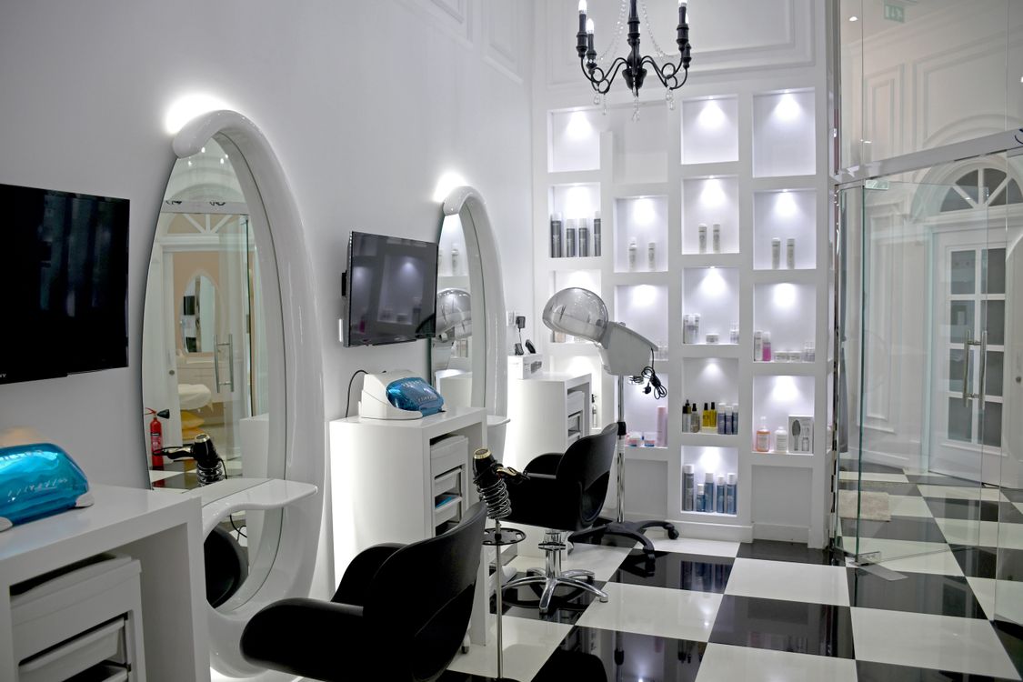 Chic modern beauty salon interior ideal for stylists seeking booth rental