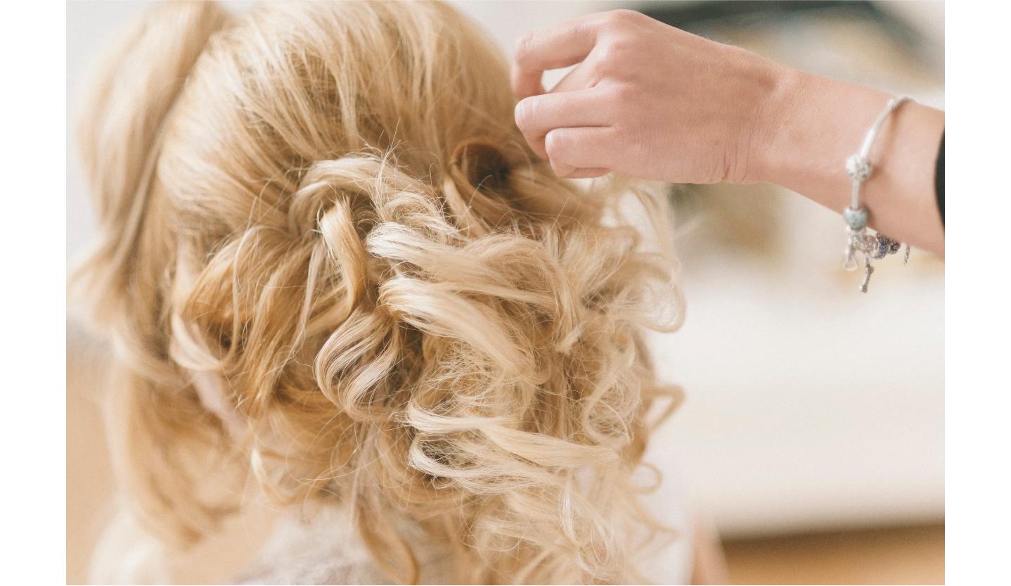 Elegant curled updo styling for special occasions at Salon Alure near Hillsboro, VA